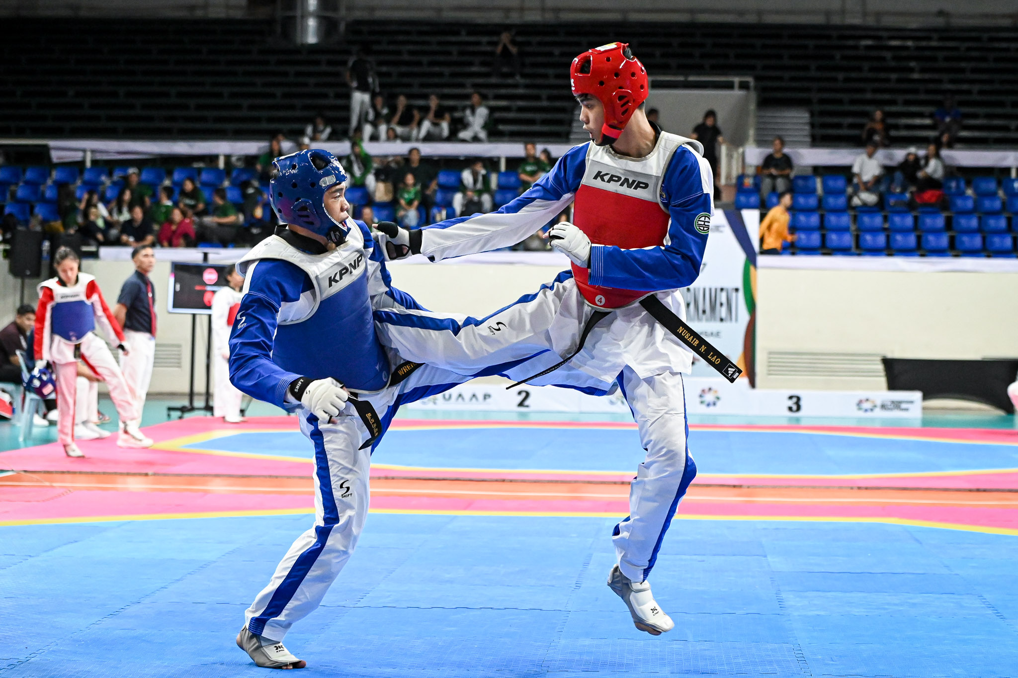 Defending champs NU Men's, UST Women's dominate opening day of UAAP Taekwondo Tournament